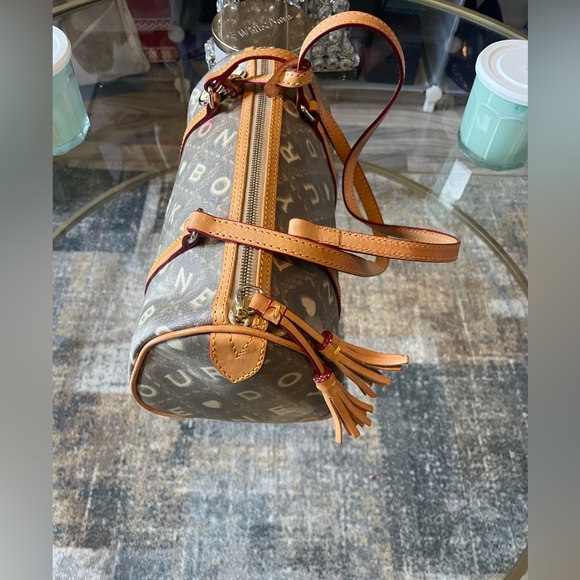 Dooney & Bourke (rare!!)
Barrel Brown/Tan/Cream Color Writing (Coffee) duffle - Picture 7 of 10